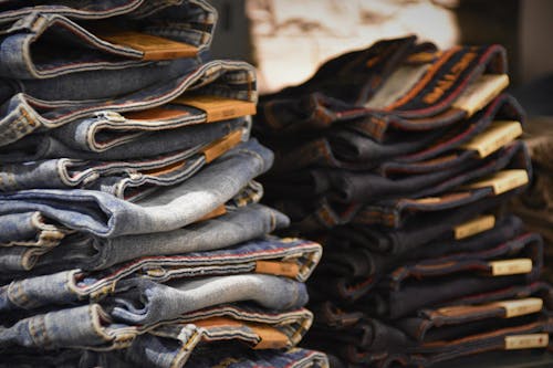 Free Pile Of Denim Jeans Stock Photo